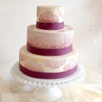 Wedding cake with edible lace & ribbon.